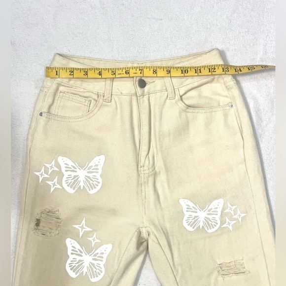 SHEIN Tan Boot Cut Jeans with White Butterfly Design - Picture 4 of 7